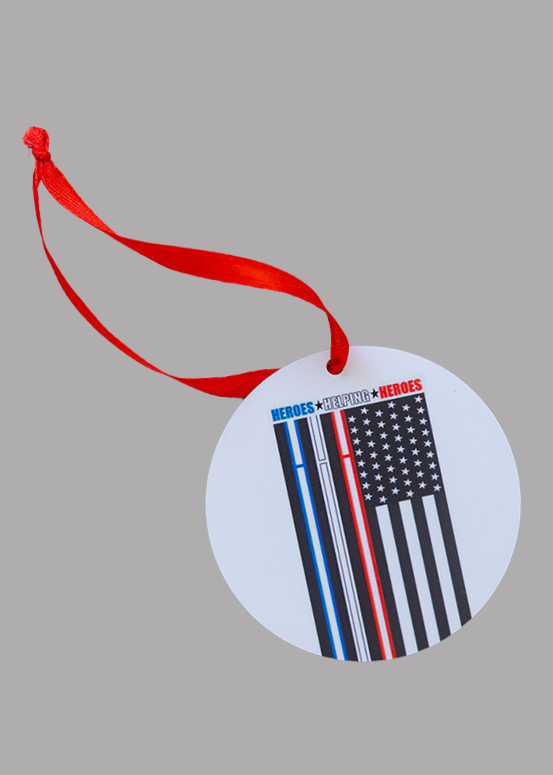 Round ornament with heroes helping heroes logo