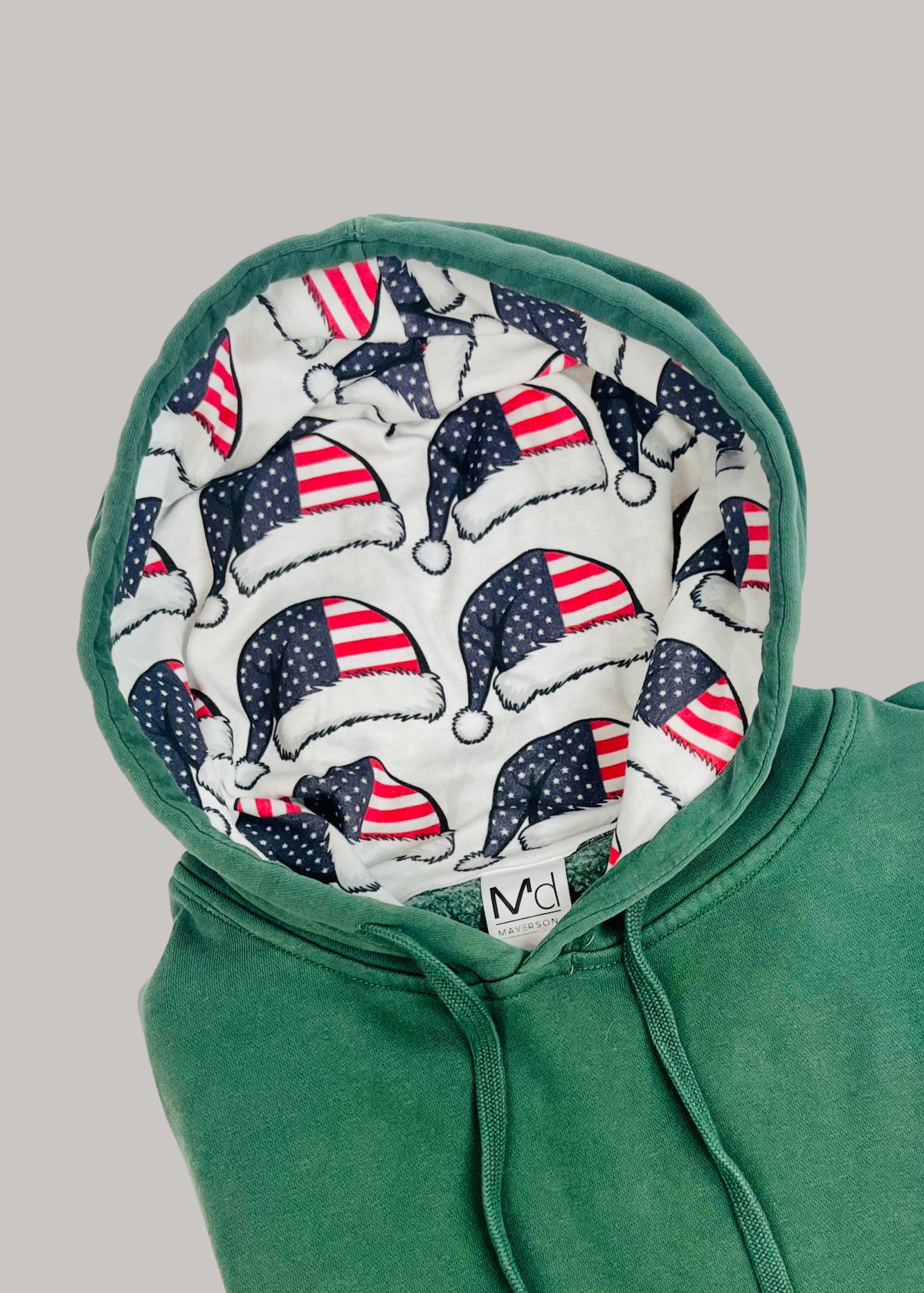 santas hat in hood green hoodie