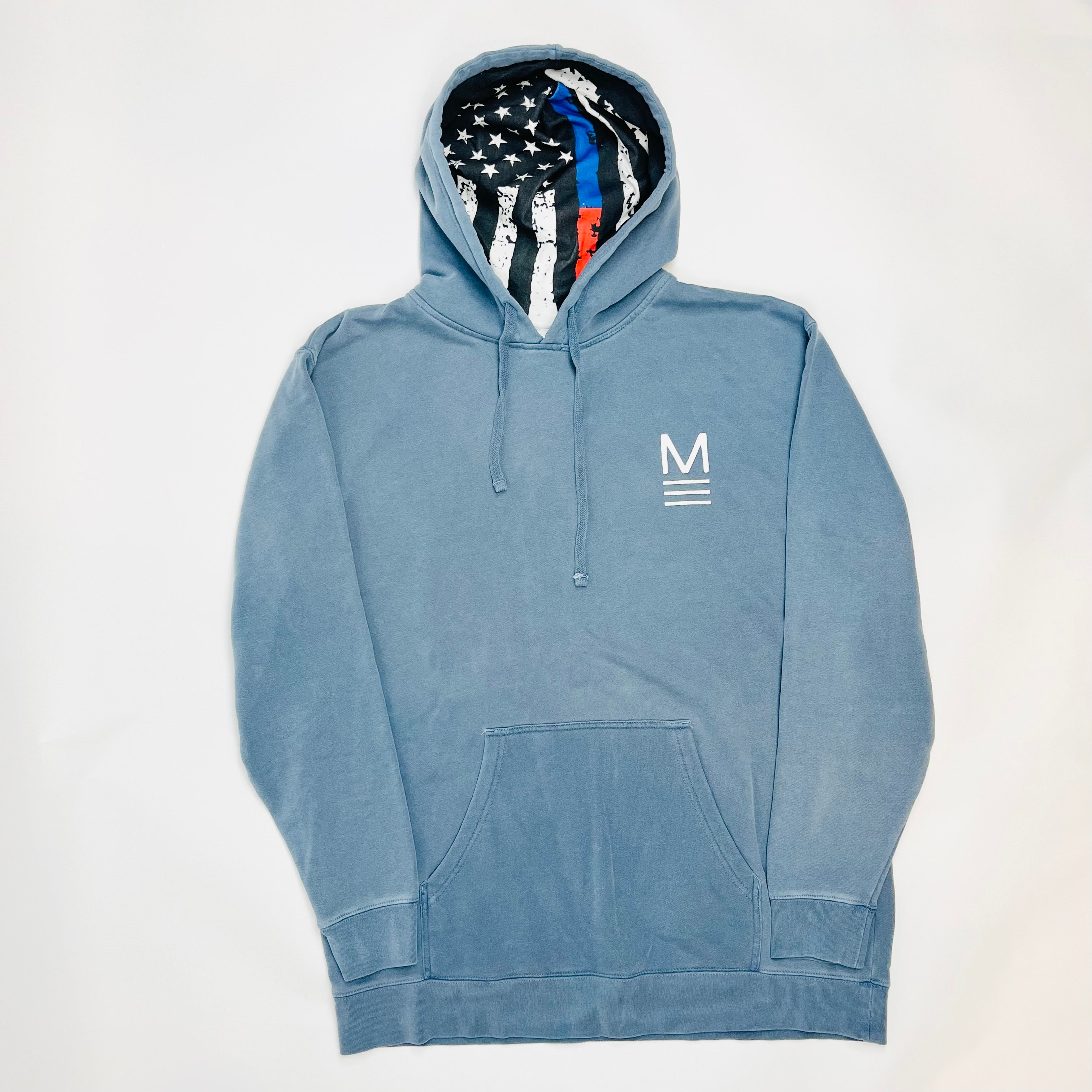 Blue hoodie with American flag lining on a white background. Line of Duty patriotic hoodie with blue and red flag design