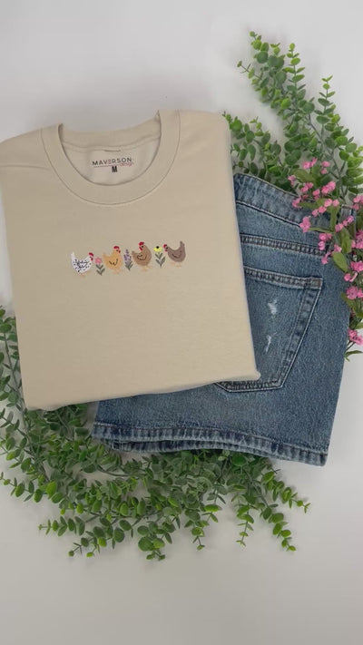 chickens and flowers video close up